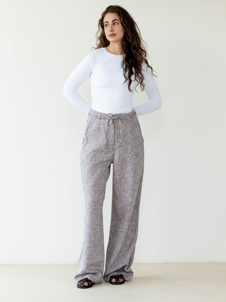 A fully elasticated brown ankle length cotton linen pant